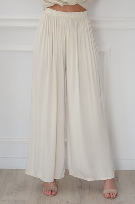 Luźne spodnie z wiskozy na gumie jasny beż Haden